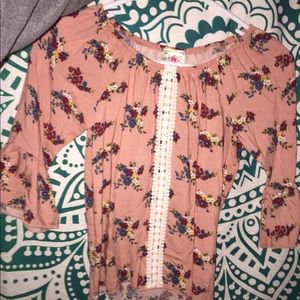 This is a kids 7/8 floral shirt